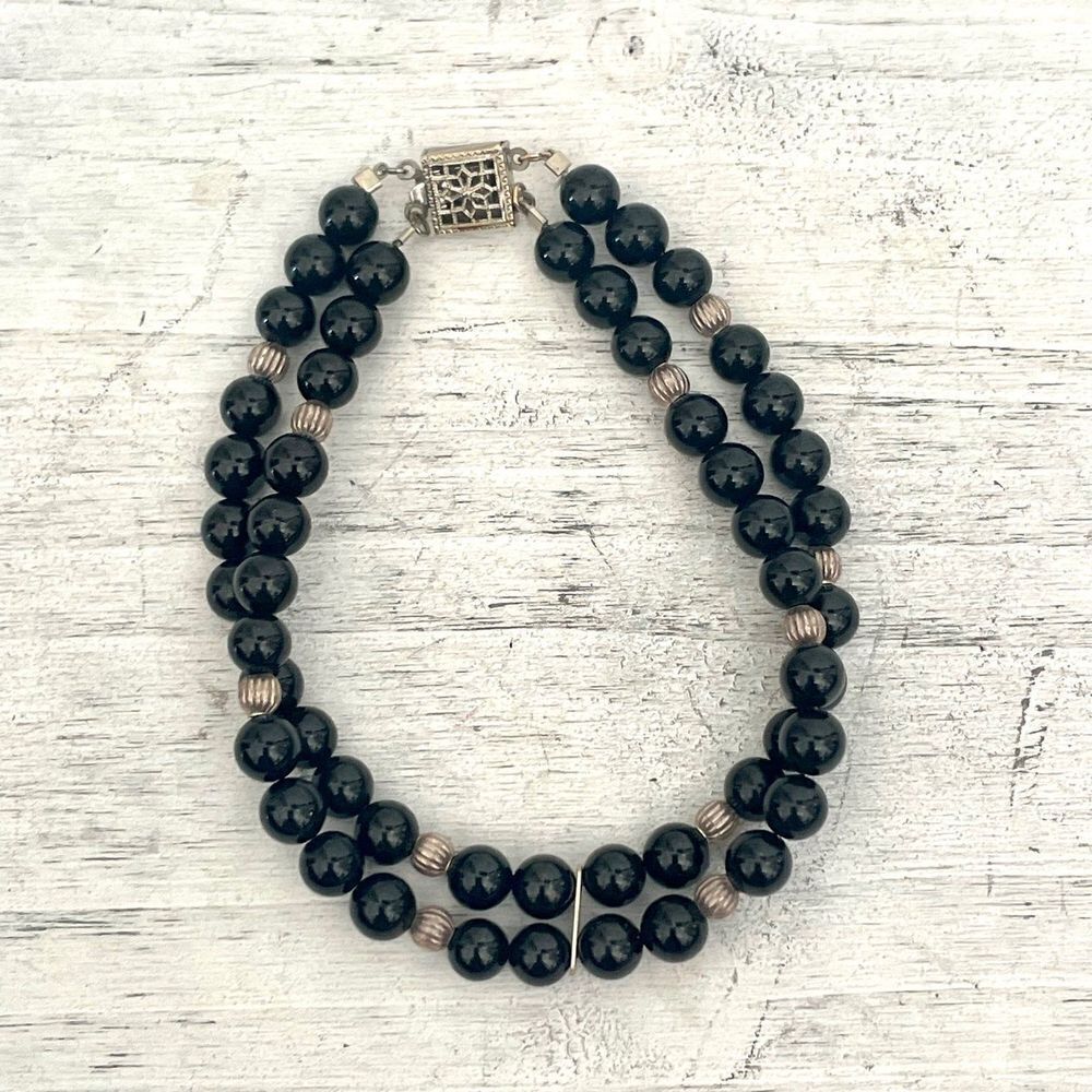 Black beaded silver tone double strand bracelet